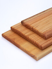 wooden board for slicing food on a white background