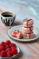 French pink macaroons on a light background 