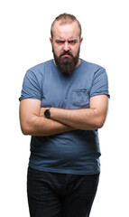 Obraz premium Young caucasian hipster man over isolated background skeptic and nervous, disapproving expression on face with crossed arms. Negative person.