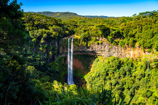 The famous twin cascades of Chamarel in the south of Mauritius. Tallest waterfalls of the tropical island (Indian Ocean). Popular touristic sight and natural wonder seen from an elevated view point.
