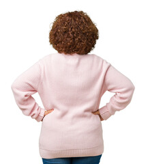 Middle ager senior woman wearing changeable blue color ribbon awareness over isolated background...