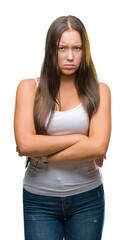 Fototapeta premium Young caucasian beautiful woman over isolated background skeptic and nervous, disapproving expression on face with crossed arms. Negative person.