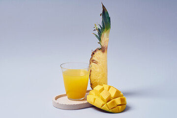 Tropical fruits variety on a colorful background. Side view with copy space