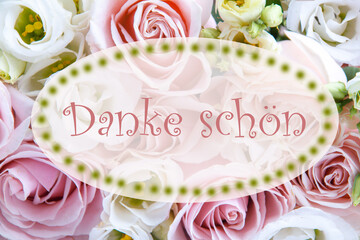 Danke schoen, thank you card in german language, pink letters on transparent oval on roses background, pastel colors
