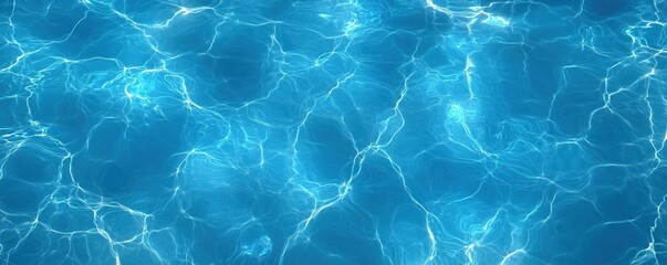Obraz premium A tranquil surface of clear blue water, showcasing intricate reflections and ripples, perfect for relaxation and inspiration.