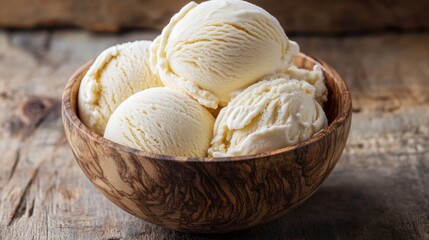 Fototapeta premium Icecream Vanilla Bowl Top. Tasty Vanilla Ice Cream Closeup on Wooden Table