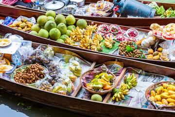 Famous floating market in Thailand, Damnoen Saduak floating market, Tourists visiting floating market by boat at Damnoen Saduak Thailand, Ratchaburi, Thailand.