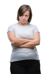 Fototapeta premium Young adult woman with down syndrome over isolated background skeptic and nervous, disapproving expression on face with crossed arms. Negative person.