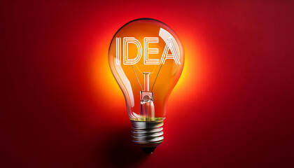  A glowing light bulb with the word 'IDEA' on a red background. _1(46)