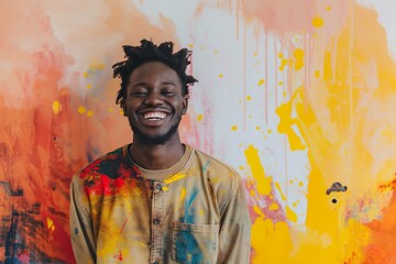 Fototapeta premium Creative Artist Smiling Against Colorful Abstract Painting Background