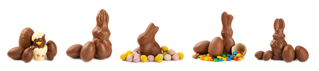 Easter chocolate bunny, chick and chocolate eggs isolated on white background. Chocolate eggs and other sweets. Easter celebration concept. Easter sweets on the table. Place for text. copy space.
