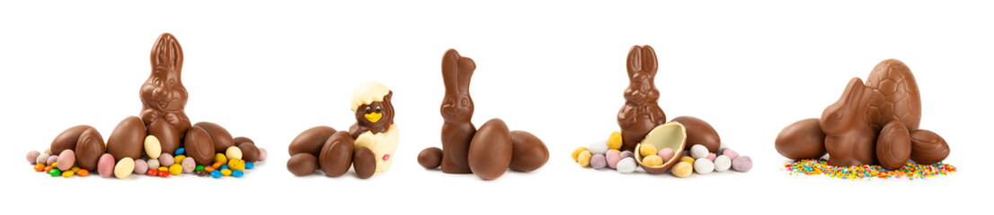 Easter chocolate bunny, chick and chocolate eggs isolated on white background. Chocolate eggs and other sweets. Easter celebration concept. Easter sweets on the table. Place for text. copy space.