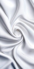 Obraz premium A swirling texture of smooth, white fabric creating an elegant and soft appearance suitable for various creative projects.