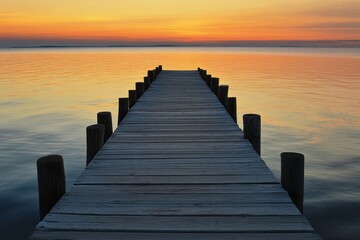 Fototapeta premium Vibrant hues by the pier post sunset