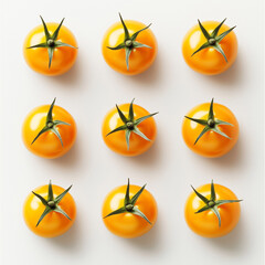 Yellow tomatoes on a clean white background.