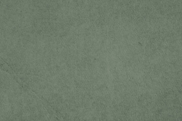 Sage color parchment paper as background, closeup of texture