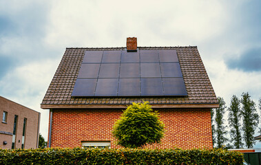 Solar panel on the house roof, alternative source of energy in Belgium. Concept of the green agenda