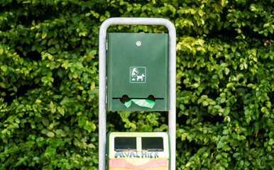 Clean up after your dog. A dog poop bag dispenser on the streets in Belgium