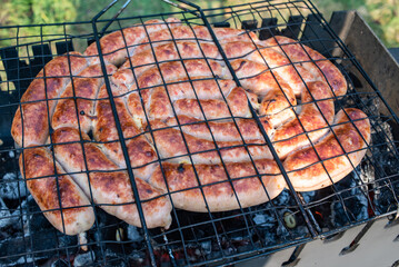 Sausage fried on the grill