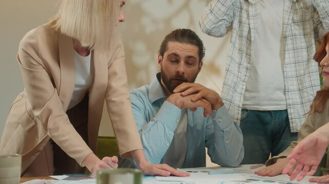 Coworking group multiracial office team men women girls guys arguing business discussion documents problem male female architects designers conflict quarrel misunderstanding shout scream fight stress