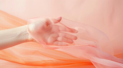 Naklejka premium A hand reaching out through pink fabric.