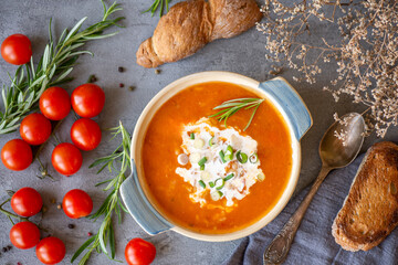 Tomato soup on grey background