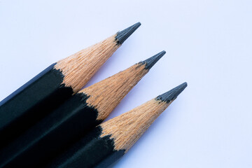 Close-up of a black wooden pencil,The tip of a wooden pencil is seen close up