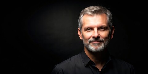 Obraz premium Man with Grey Hair and Beard in a Dark Shirt, portrait, close-up, studio portrait, man, portrait photography, dark background