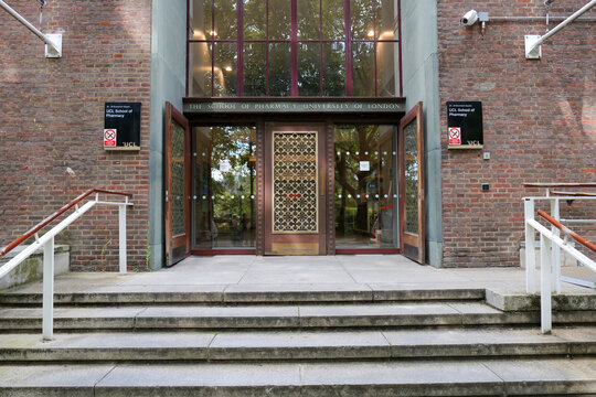 Entrance to the Univeristy of London School Of Pharmacy with decorative doors and glass atrium windows. London, UK 08 27 2024 