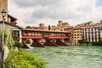 Naklejka premium Ponte degli Alpini in Bassano del Grappa, Veneto, Italy – An iconic wooden bridge spanning the Brenta River