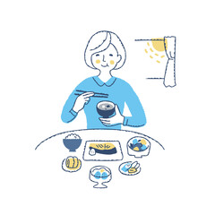 栄養バランスの良い朝食を食べている女性