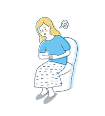 トイレでお腹を押さえている女性　