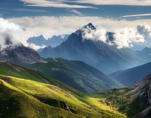Fototapeta premium Majestic Mountain Range Above Scenic Valley with Rolling Clouds and Lush Greenery Breathtaking Nature Landscape Ideal for Wilderness Adventures and Spiritual Retreats