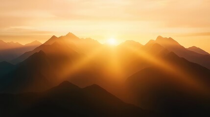 Obraz premium A breathtaking sunrise illuminating majestic mountains, creating a serene and tranquil landscape filled with warm colors.