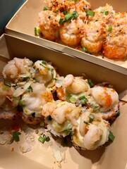 Delicious Japanese rolls with fish and shrimp