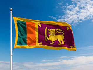 Sri Lanka flag waving in the wind against a blue sky background