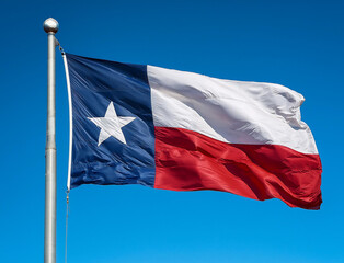Texas state flag waving in the wind against a blue sky background