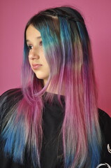 Girl with Long Colorful Hair Dyed in Horizontal Blue, Purple, and Pink Stripes