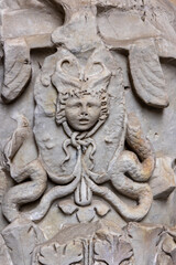 Beautiful sculptures carved in stone and marble in the Roman Colosseum. Rome, Italy.