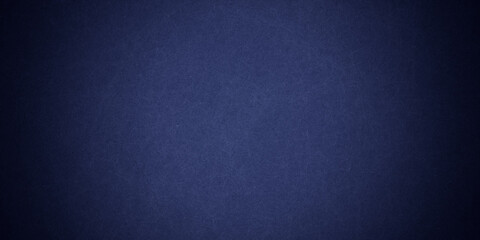 Dark blue background texture with black vignette in old vintage grunge textured border design, dark elegant teal color wall with light
