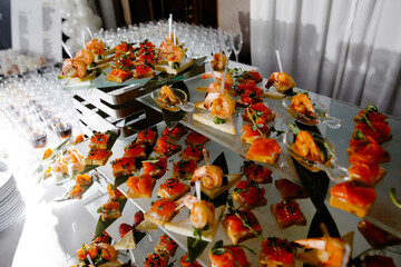 catering banquet table, Assortment buffet, Catering set, various appetizers, Different canapes, meat specialities, Festive banquet table, delicious food, food snacks, catering wedding buffet,