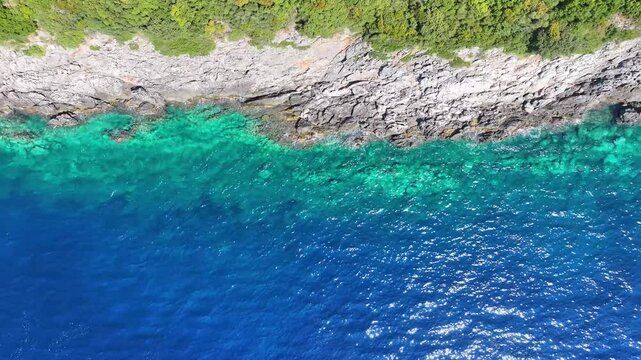 Ionian sea Gjipe beach Albania blue turquoise water and rock