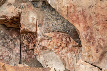 Ancient rock art at Cueva de Las Manos ( Cave of the Hands ) in Santa Cruz Province, Patagonia,...
