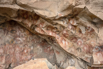 Ancient rock art at Cueva de Las Manos ( Cave of the Hands ) in Santa Cruz Province, Patagonia,...