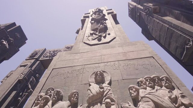 Bronze figures depicting important people and events in georgian history are part of chronicle of georgia monument designed by zurab tsereteli