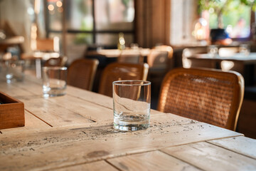 The aesthetic COZY appearance of an empty cafe with wooden furniture and minimalism.