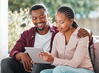 Black people, couple and happy with tablet on sofa at home with browsing internet for house...