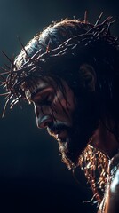 Jesus with a crown of thorns on his head, in side view, against a dark background