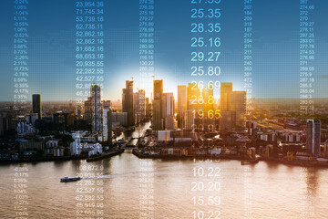 Canary wharf building, stock market graphic background on financial market trade chart