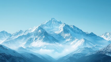 Obraz premium A breathtaking view of snow-covered mountain peaks under a clear blue sky